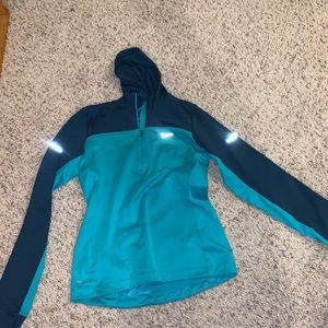 Blue nike dry-fit compression jacket